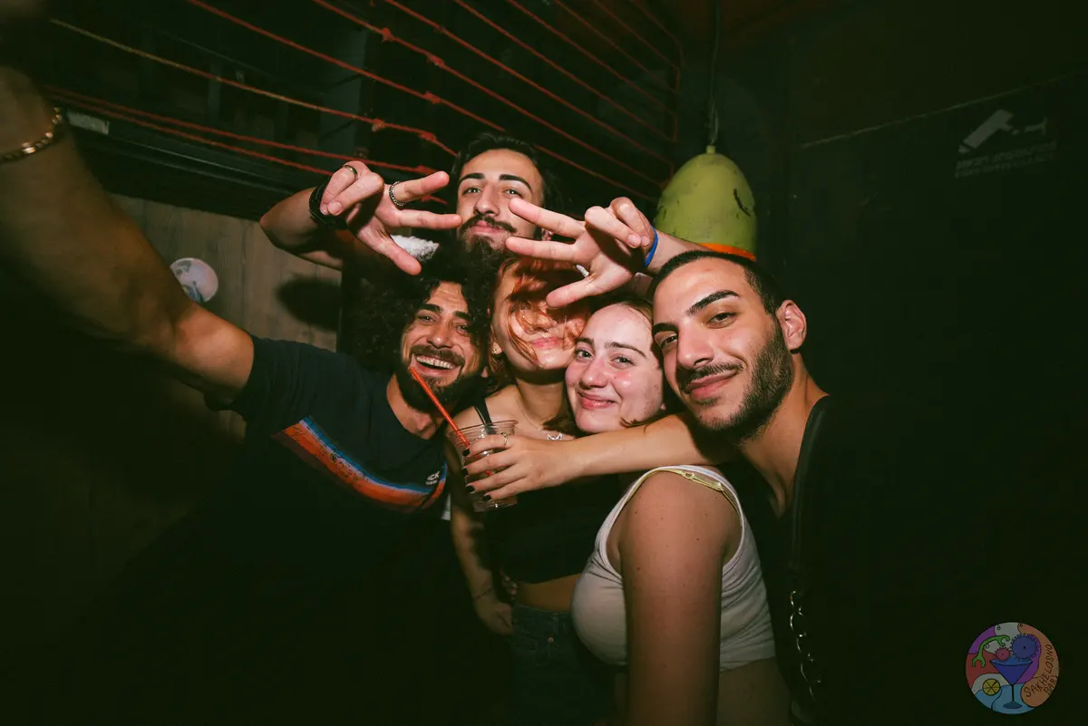 Friends having fun at a birthday party in a Tbilisi club