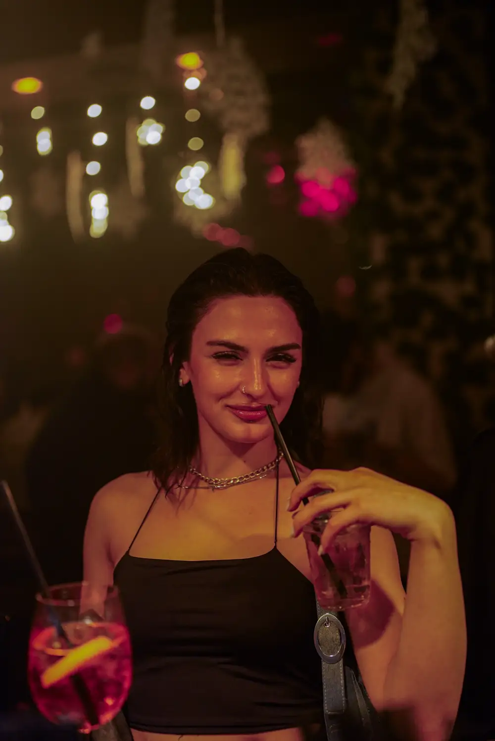 Girl with a cocktail at Sakhelosno BAR
