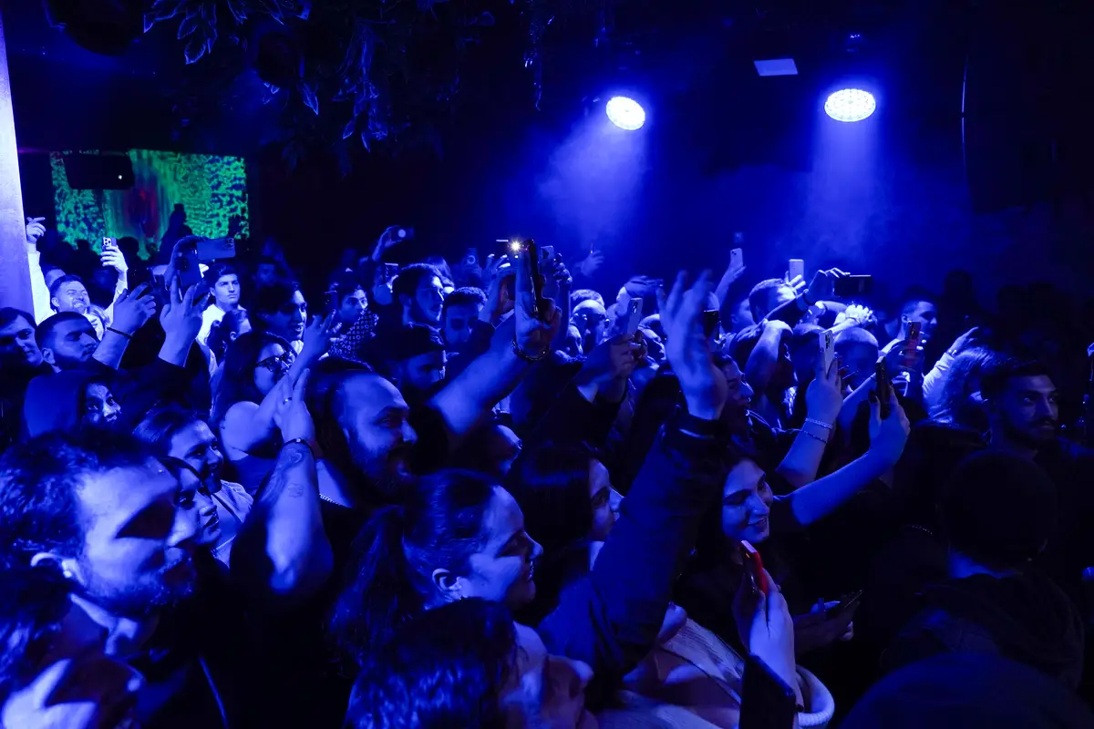DJ stage with blue lights at Sakhelosno BAR Tbilisi