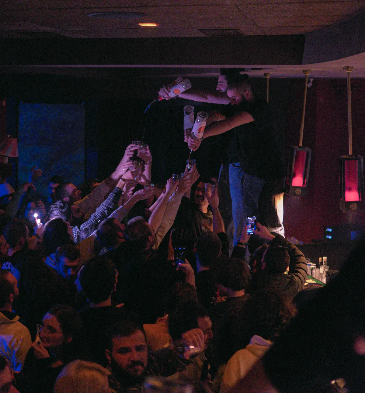 Crowd going wild during a live music show at Sakhelosno BAR Tbilisi