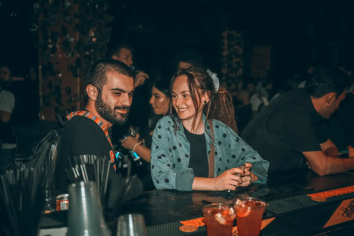 Guests chatting over drinks at the chill bar
