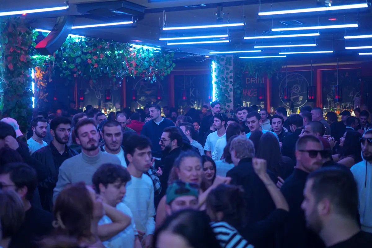 Packed dancefloor at peak hour in Sakhelosno BAR